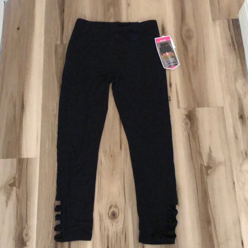 SHOSHO BLACK LEGGINGS Size Large with lace cutouts at bottom of legs.